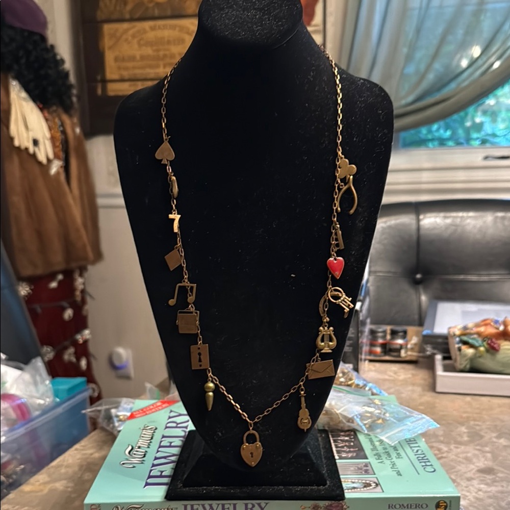 Kinetic charm necklace, vintage charms made of brass all around the chain